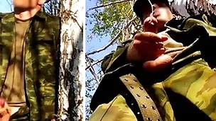 Russian soldier round a big dick on a military mission relating to the forest shoots sperm foreign his penis at opponents