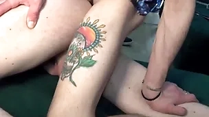 Several horny chavvy friends enjoy grabbing each other’s cocks on the sofa.