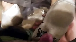 One young guys dirty socks footjob