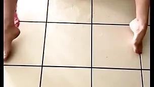 Young and pretty girl caresses and squirts hard in the brush living room like a big slut waiting to be fucked, she pisses all round less a powerful squirt