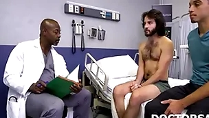 Doctor together with brother assess patient's health