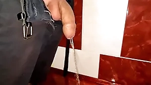 Small uncut cock pissing